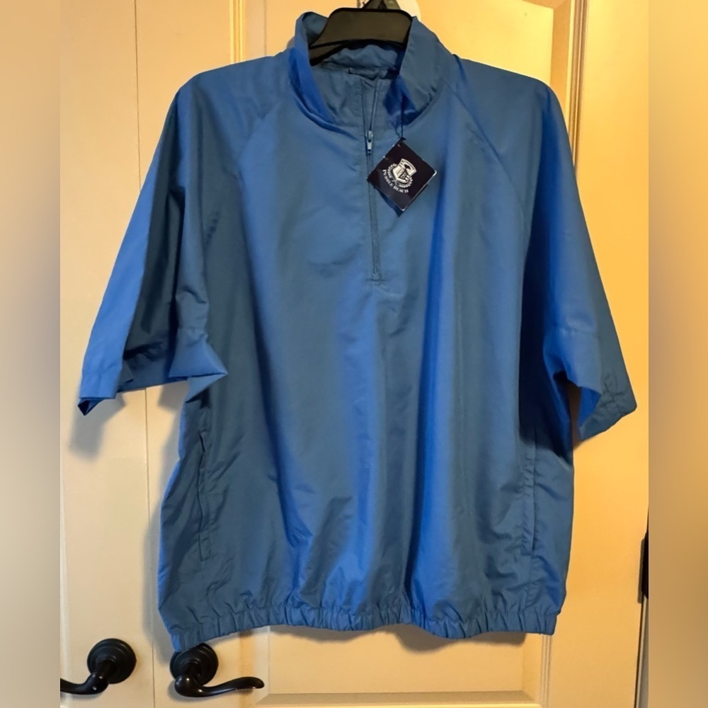 Pebble Beach men's lightweight quarter-zip golf pullover in a blue color.
